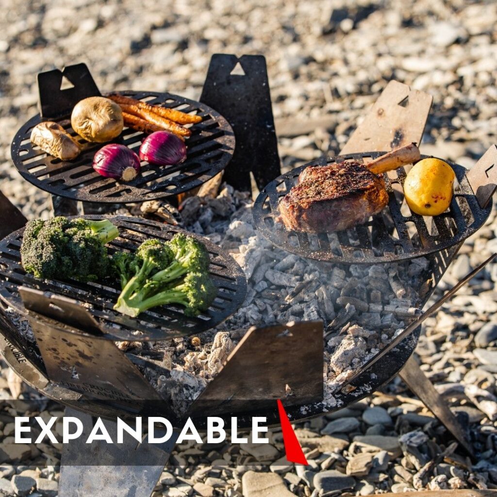 The Crucible is expandable and versatile, showing burning coals and grill plates with food in ad-form.