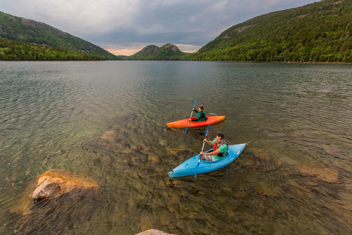 Couple kayaking on Jordan Pond in Acadia National Park, Maine, USA