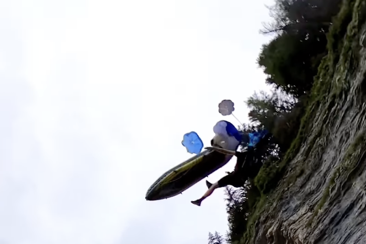 WATCH: Dude Struggles With Kayak While Parachuting off Cliff