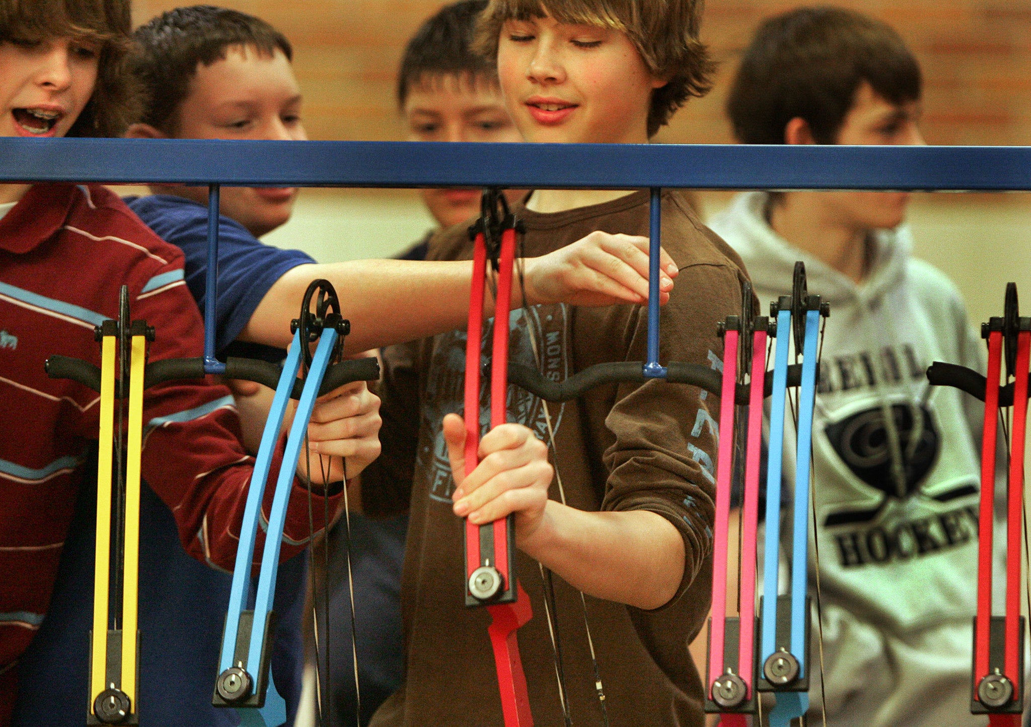 Kids learn archery in school programs.