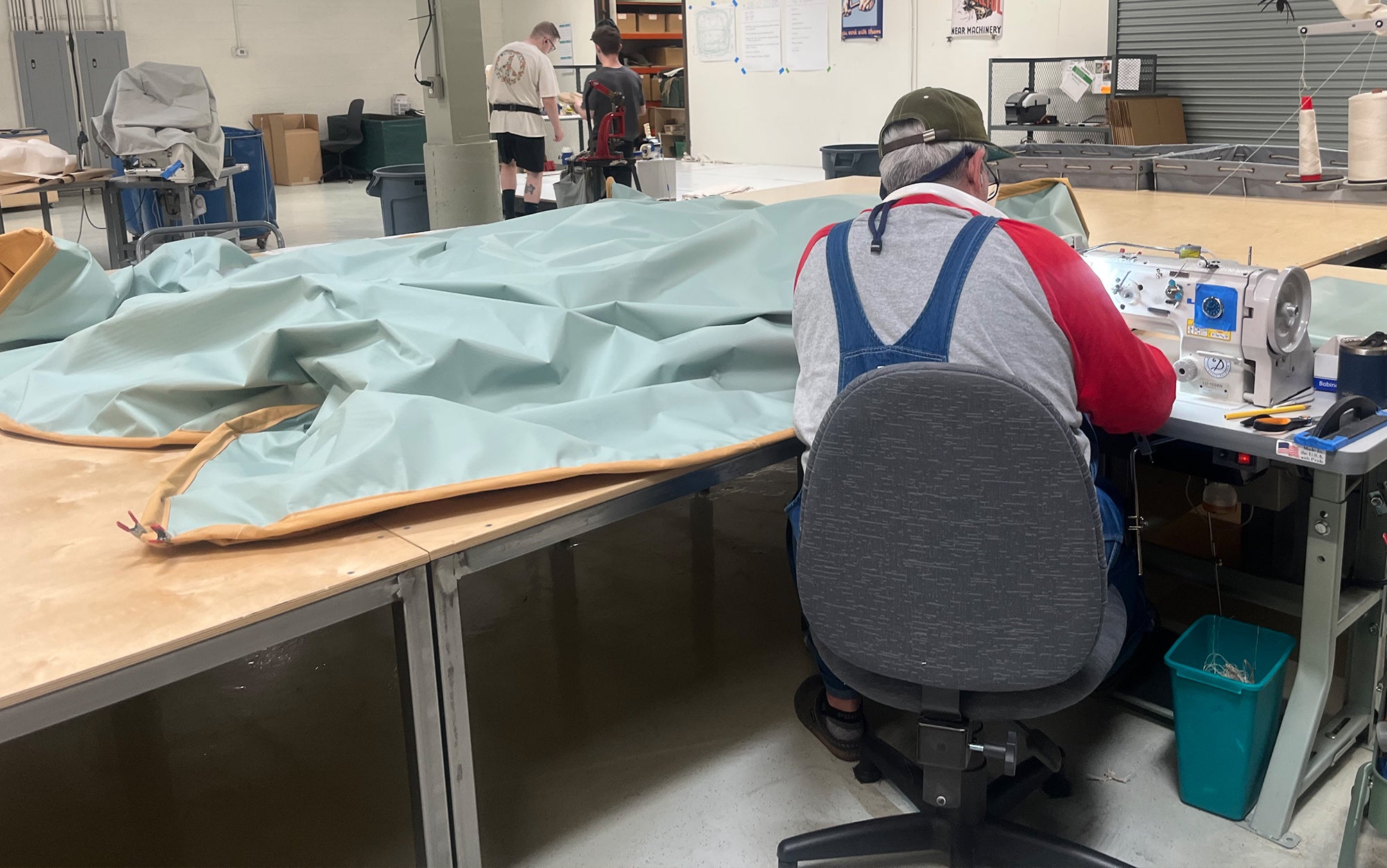 Here you can see a Springbar tent maker working on the waterproof floorâs perimeter rope.