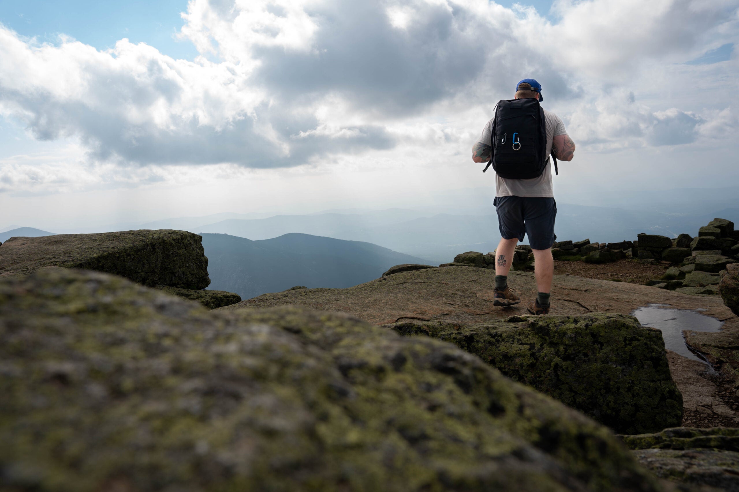 The author testing the best edc backpacks on a hike. 