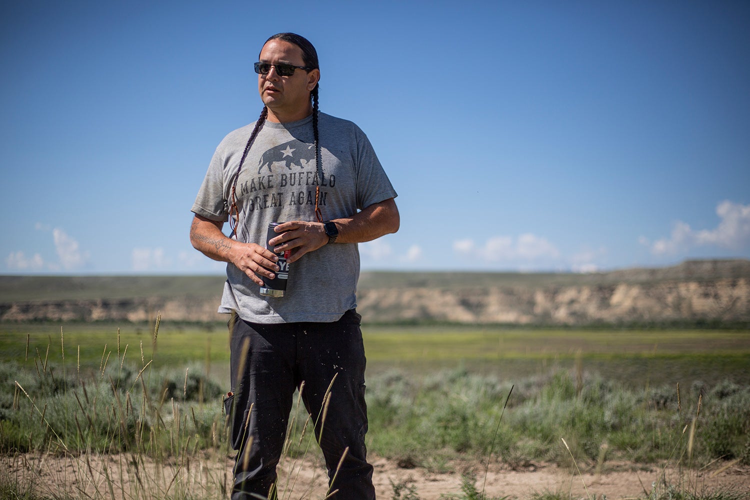 man standing on prairie