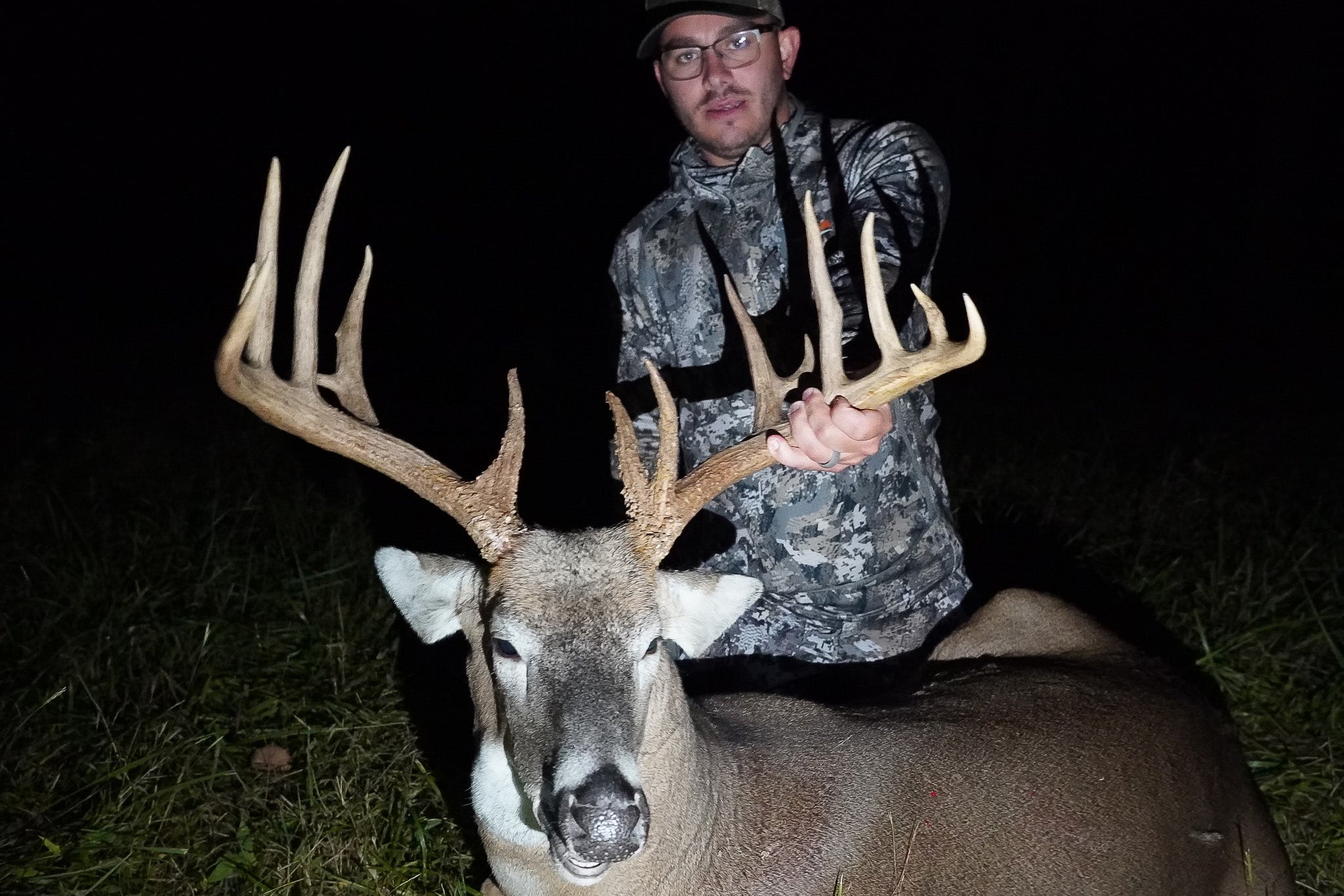 A bowhunter holds the antlers of a nontypical Ohio buck.