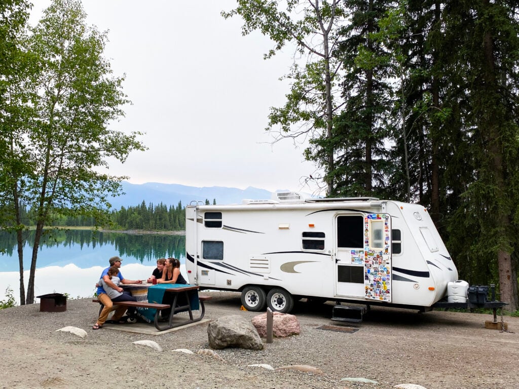 RV campsite by lake, image for RV reservations 