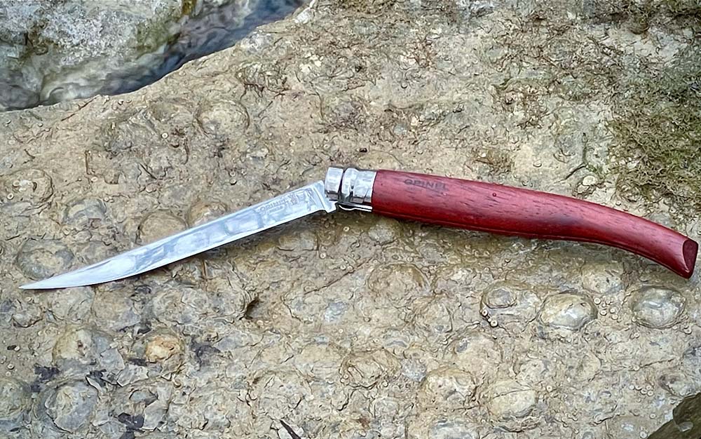 A best fillet knife with a red handle