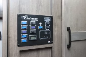 A control panel accesses various coach systems.