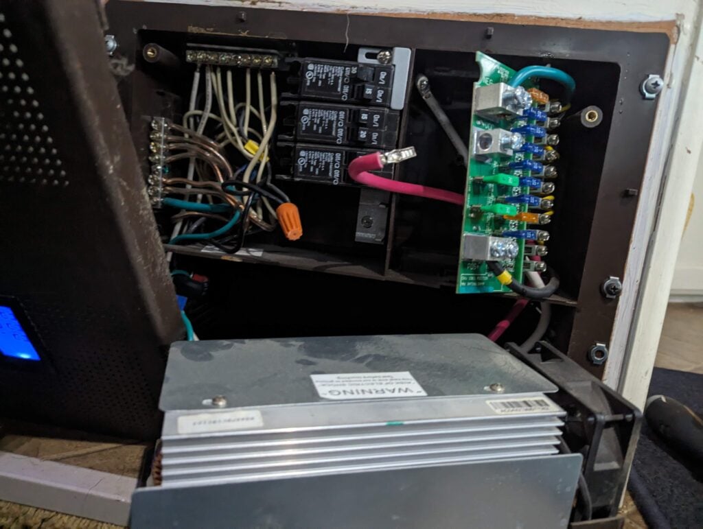 Upgrading converter installation inside an electrical compartment.