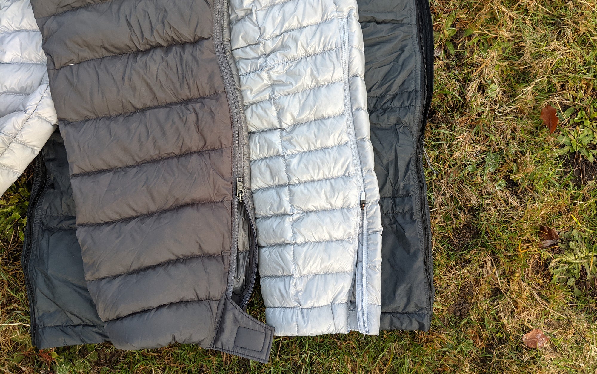 The Stone Glacier Grumman (left) had a two-way side zip, which made it easier to take off than either the Mountain Hardwear Ghost Whisperer Pant (center), which had a zip that ran from the hem up to the mid-calf or the KUIU Super Down ULTRA Pant (right) which had a one-way zip that runs down from the waist. 