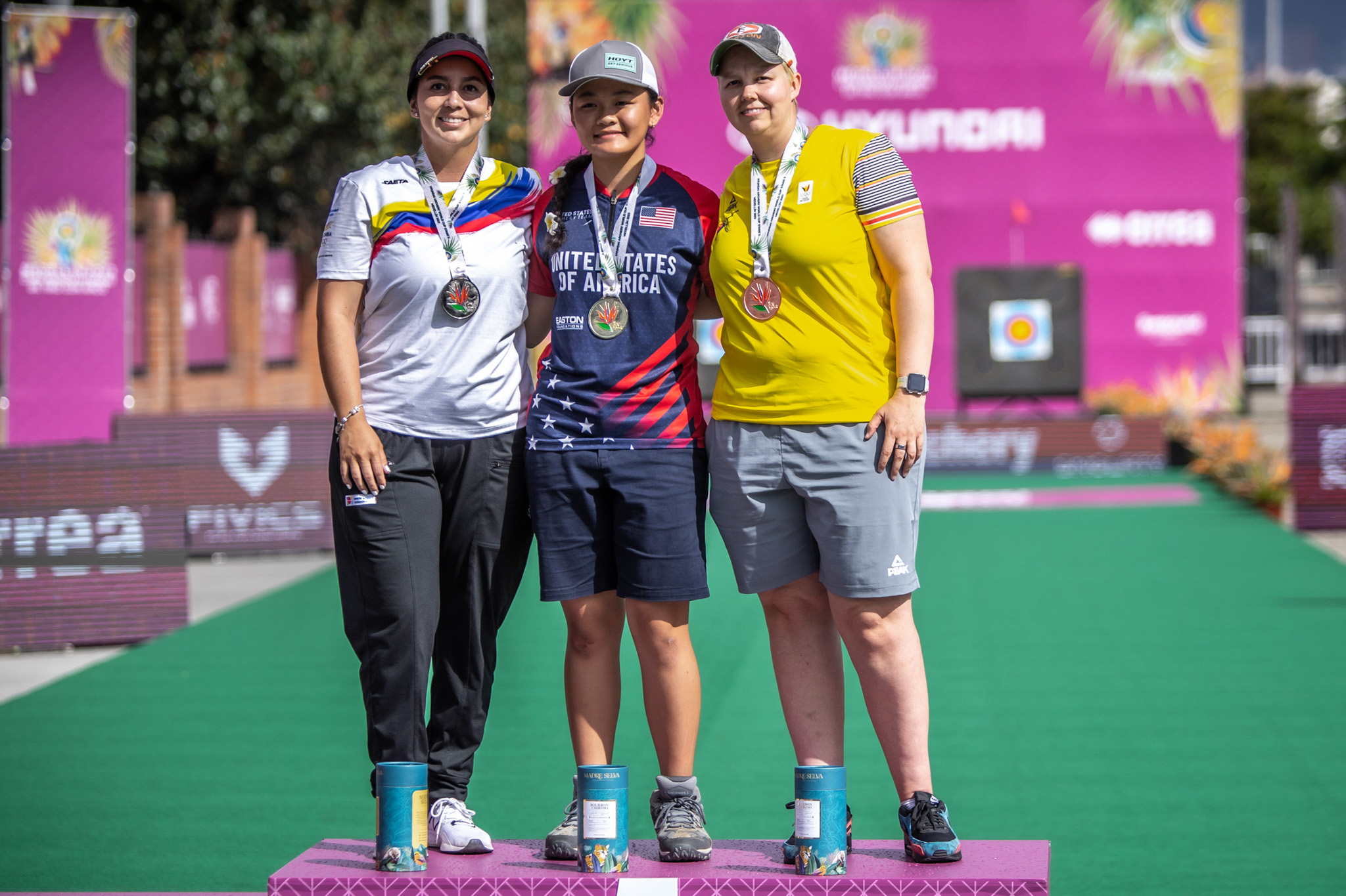 Liko Arreola, Sara Lopez, and Sarah Prieels at the World Championships archery shoot in Medellin.