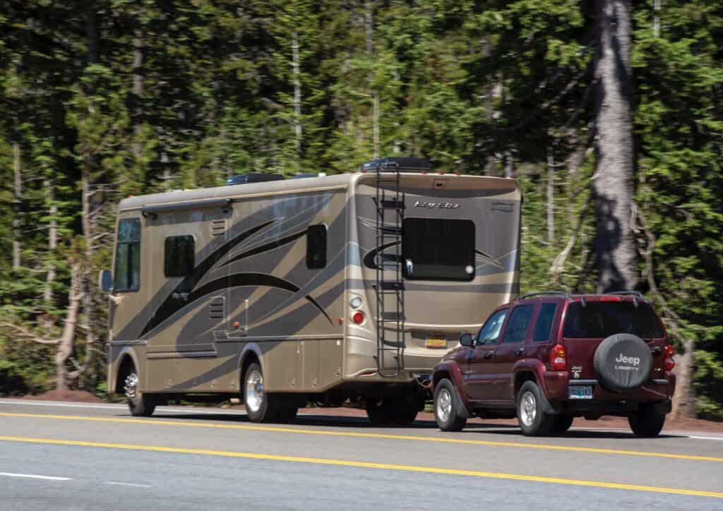 A Newmar Bay Star motorhome towing a Jeep dinghy vehicle. Photo: Bruce W. Smith.