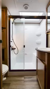 The bath includes a roomy shower with a skylight.