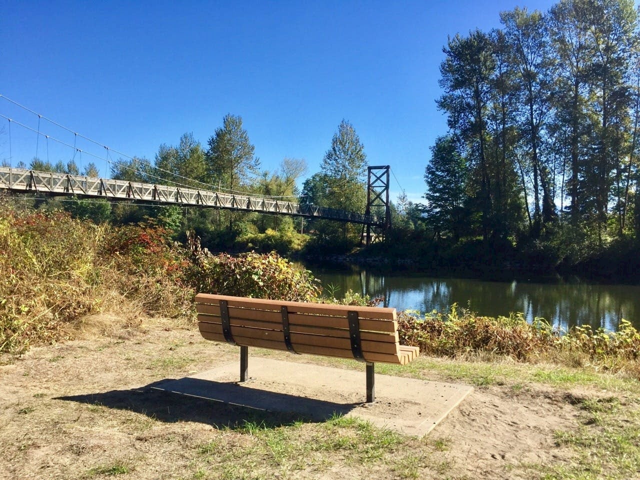 park bench looking at bridge