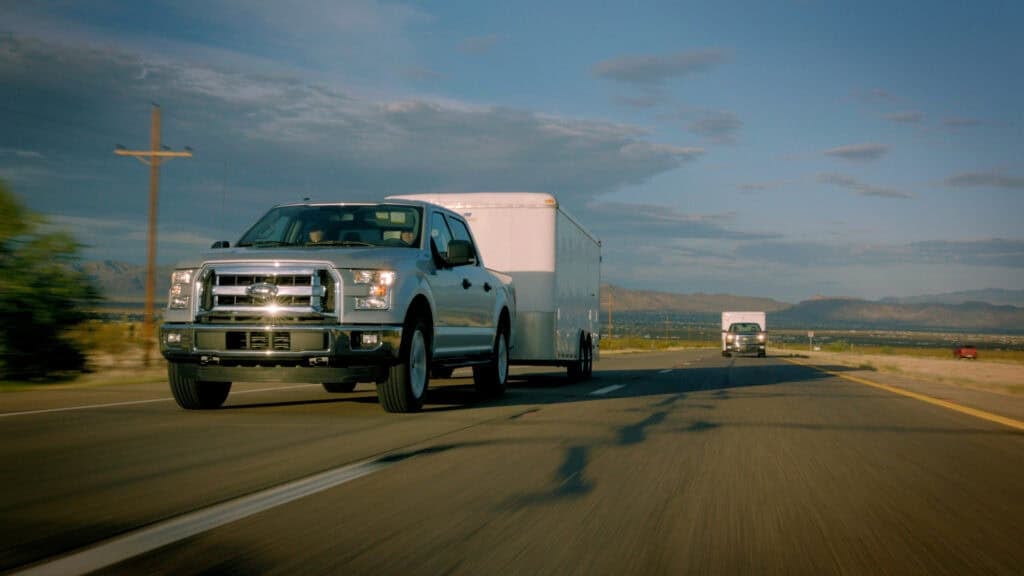 These Ford F-150s are making the infamous Davis Dam Grade test loaded to their maximum GCWR limit according to SAE J2807 parameters. Photo: Bruce W. Smith.