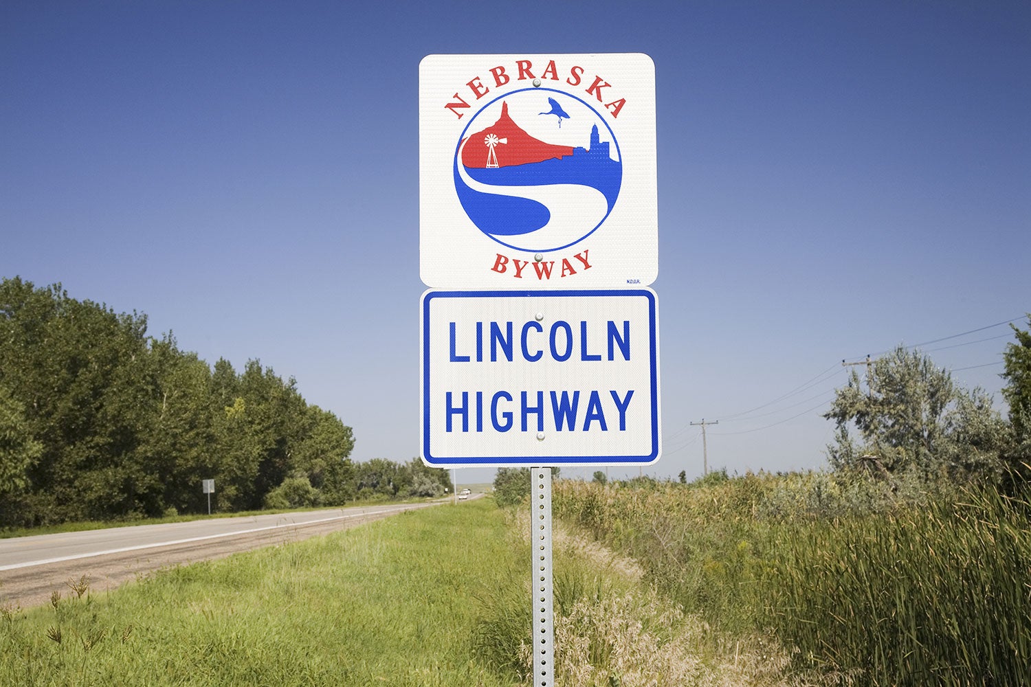 A white sign for the Old Lincoln Highway in Nebraska 