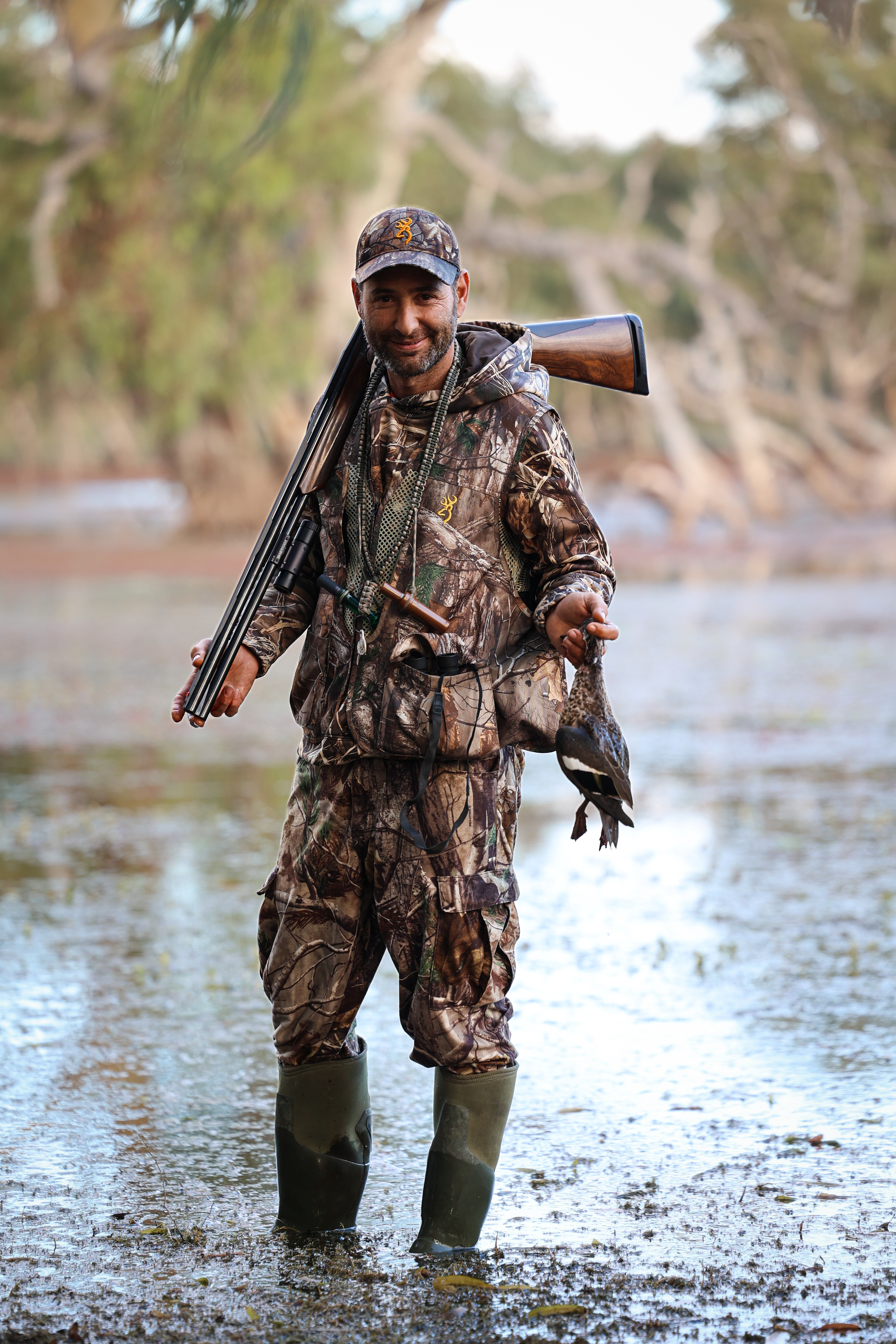 A duck hunter with a teal.
