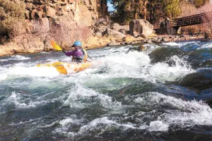 The Deschutes attracts white-water kayakers and rafters.