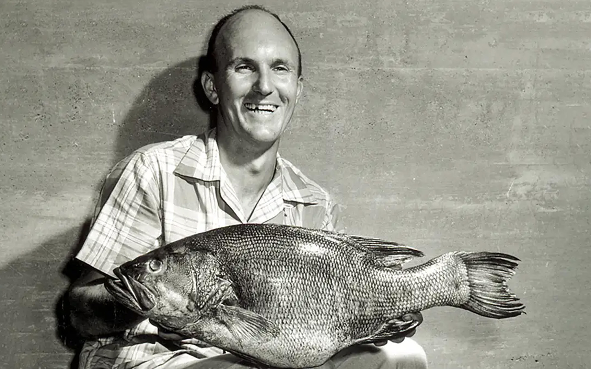 Angler with world-record smallmouth bass.