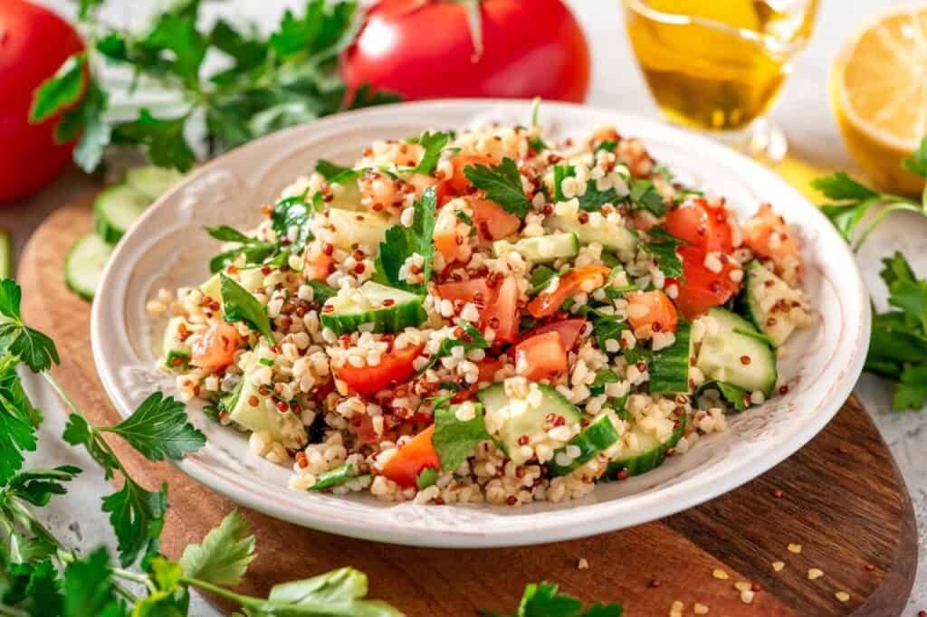 Tabbouleh salad in a bowl on the table.