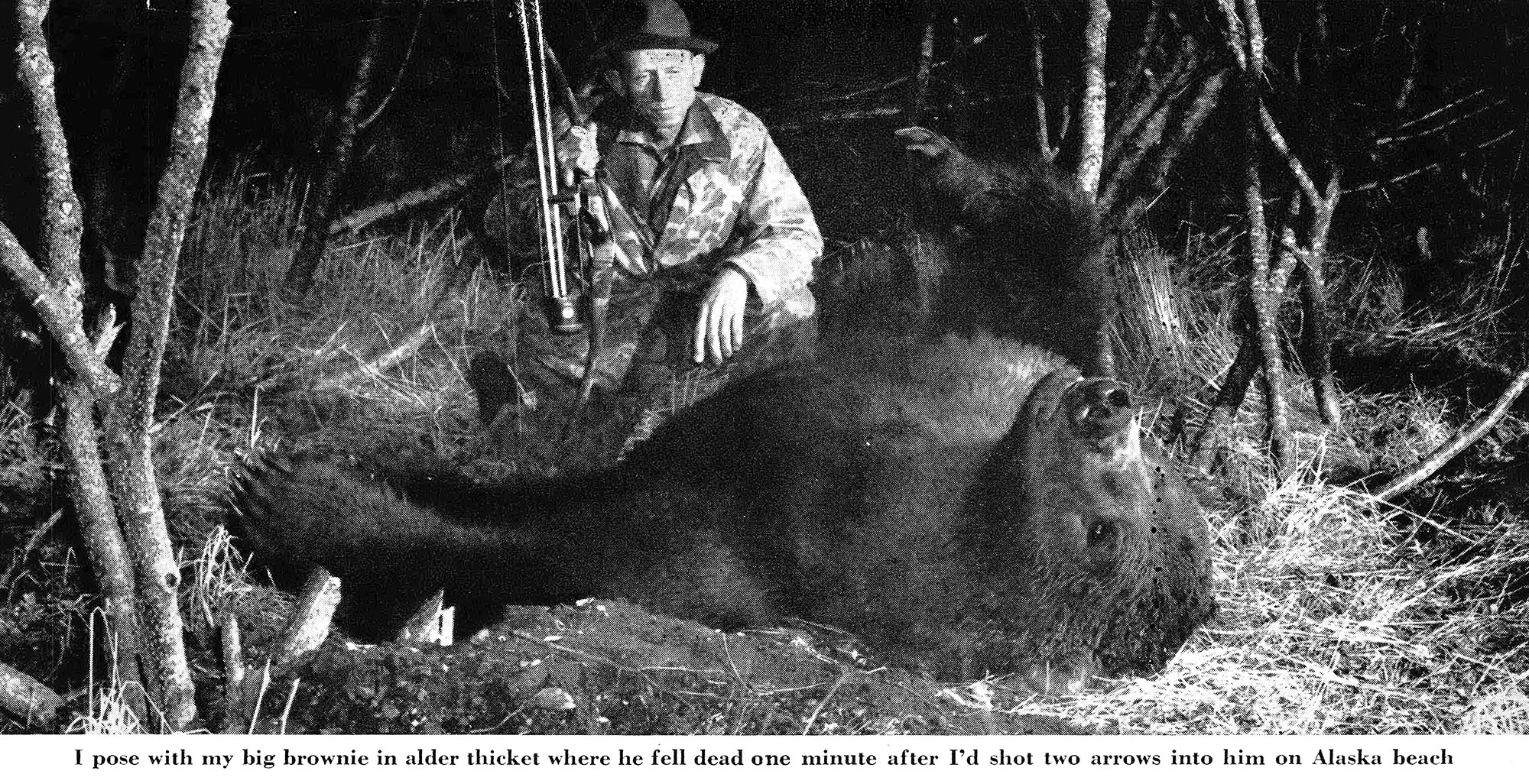 Bowhunter Fred Bear with a giant Alaska brown bear.