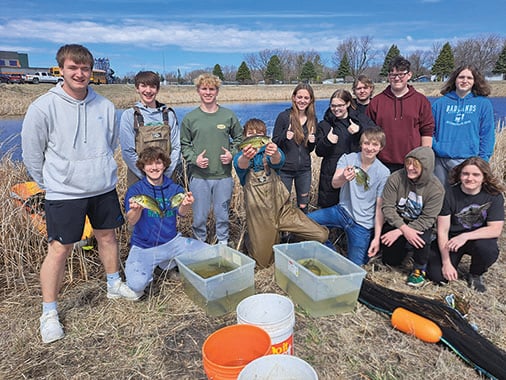 Mapleton school in Minnesota repurposes retention pond for fish, providing educational and recreational opportunity – Outdoor News