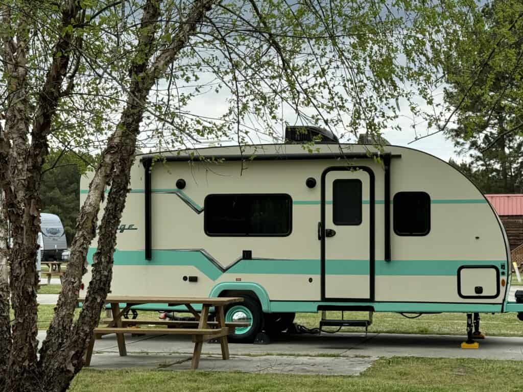 vintage travel trailer in green and white