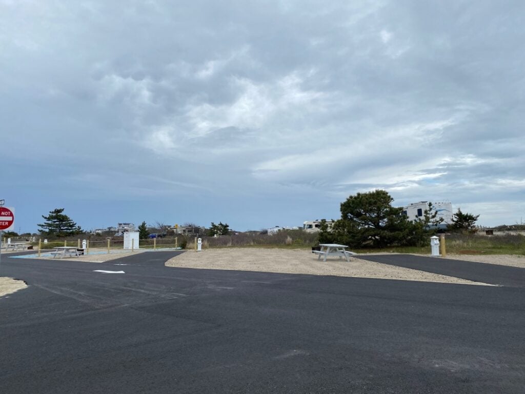 A fifth-wheel in an RV site at Horseneck Beach.