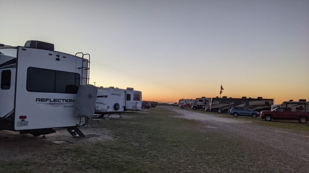 A group of RVs in oceanfront sites at Hampton State Beach Park.