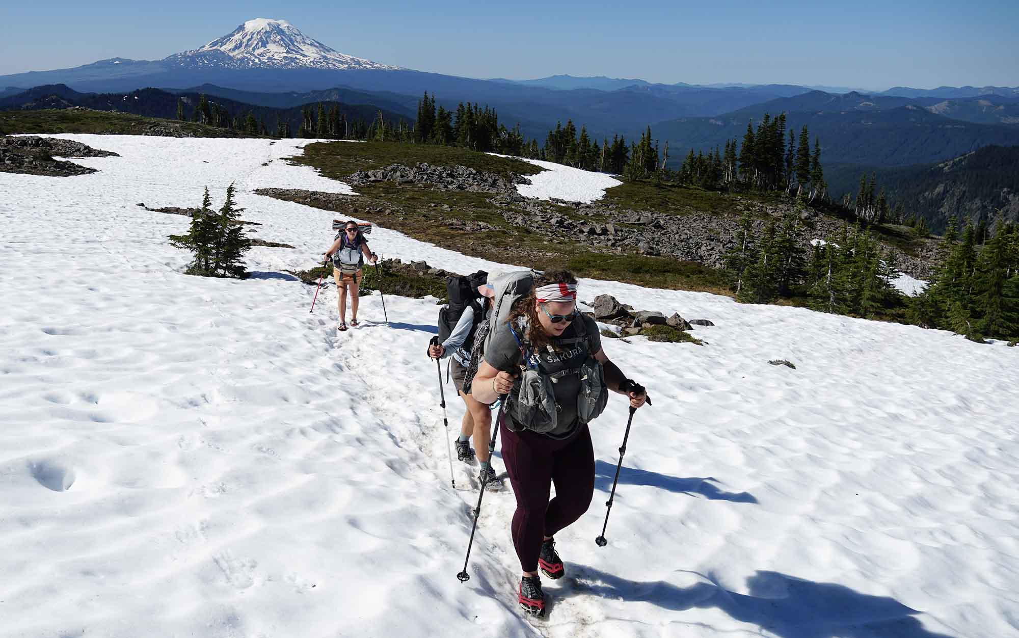 backpacking across snow in the Aarn Mountain Magic Pro