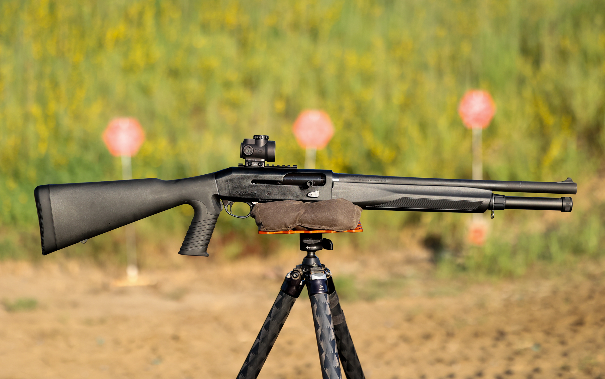  The Stoeger M3000 Pistol Grip shotgun on a tripod.