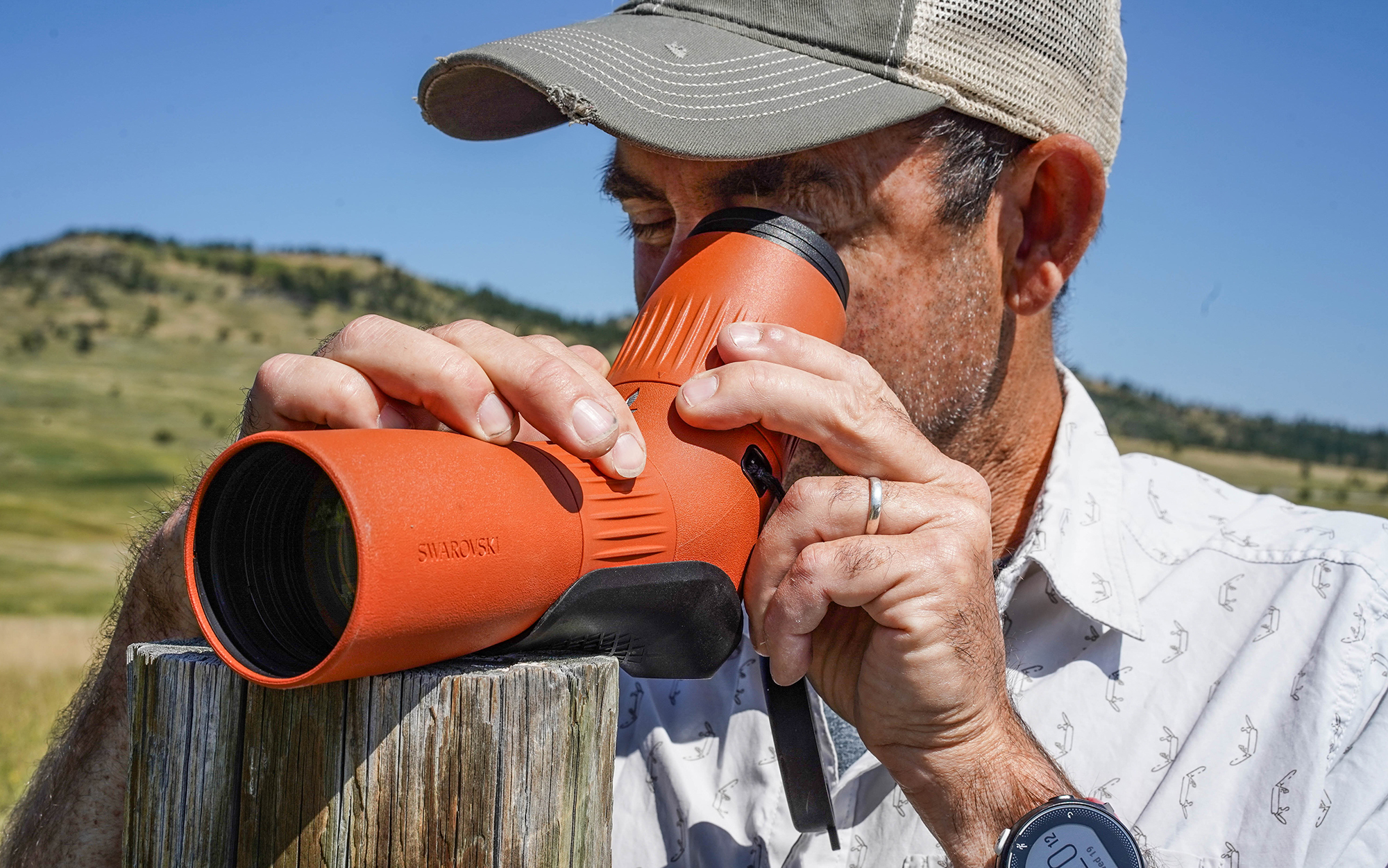 Tester must reach over the scope to make adjustments.