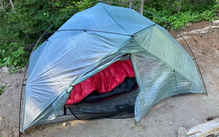  zpacks free zip set up with a red sleeping bag inside