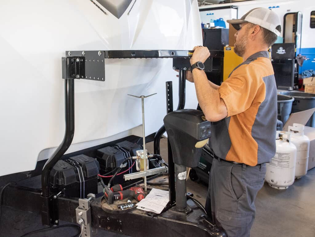 Installing the Stromberg RV storage tray. Photo: Bruce Smith.