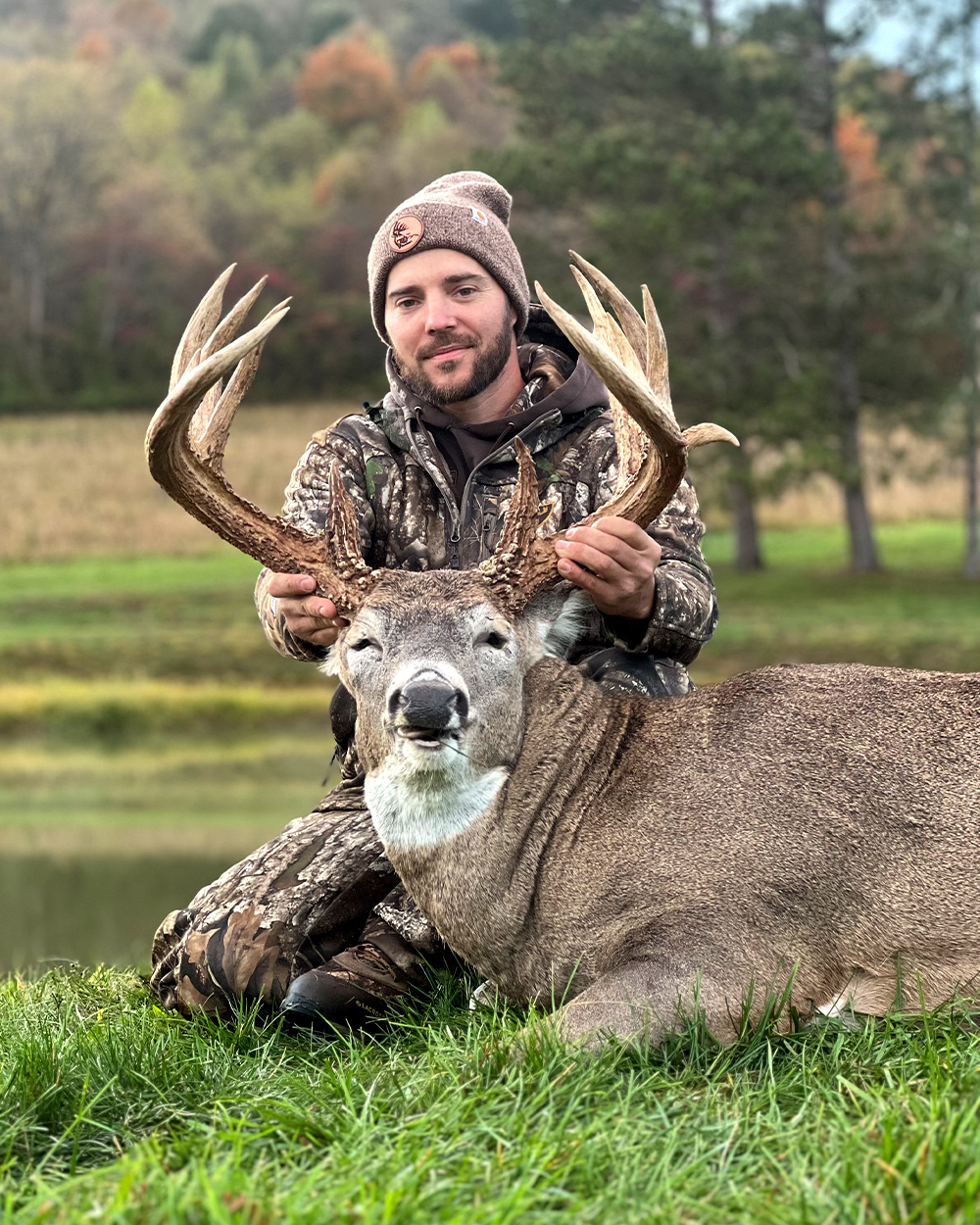 A bowhunter with a big Ohio buck.