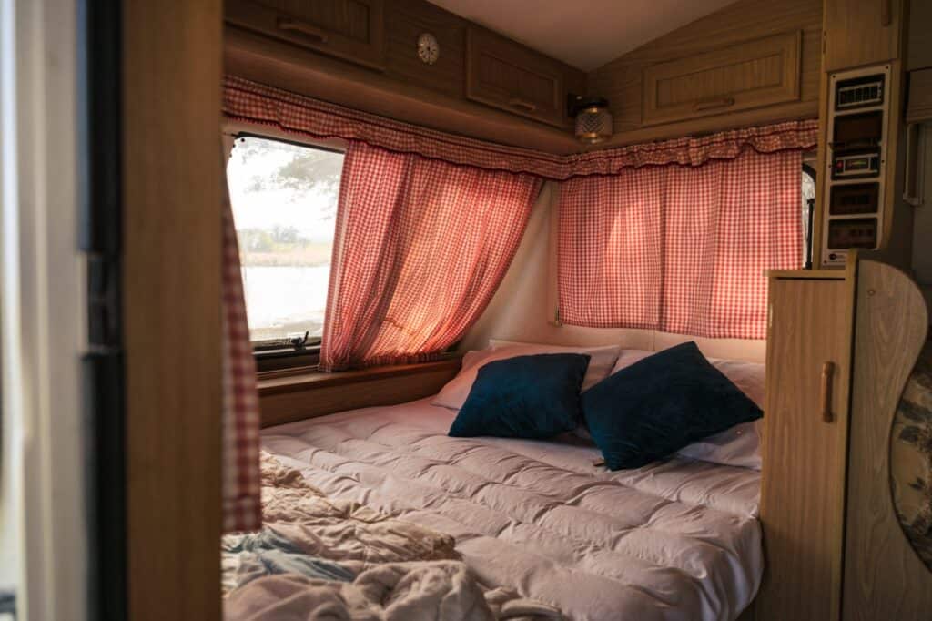 Checkered curtains have replaced the stock RV window coverings. Photo: Shutterstock.