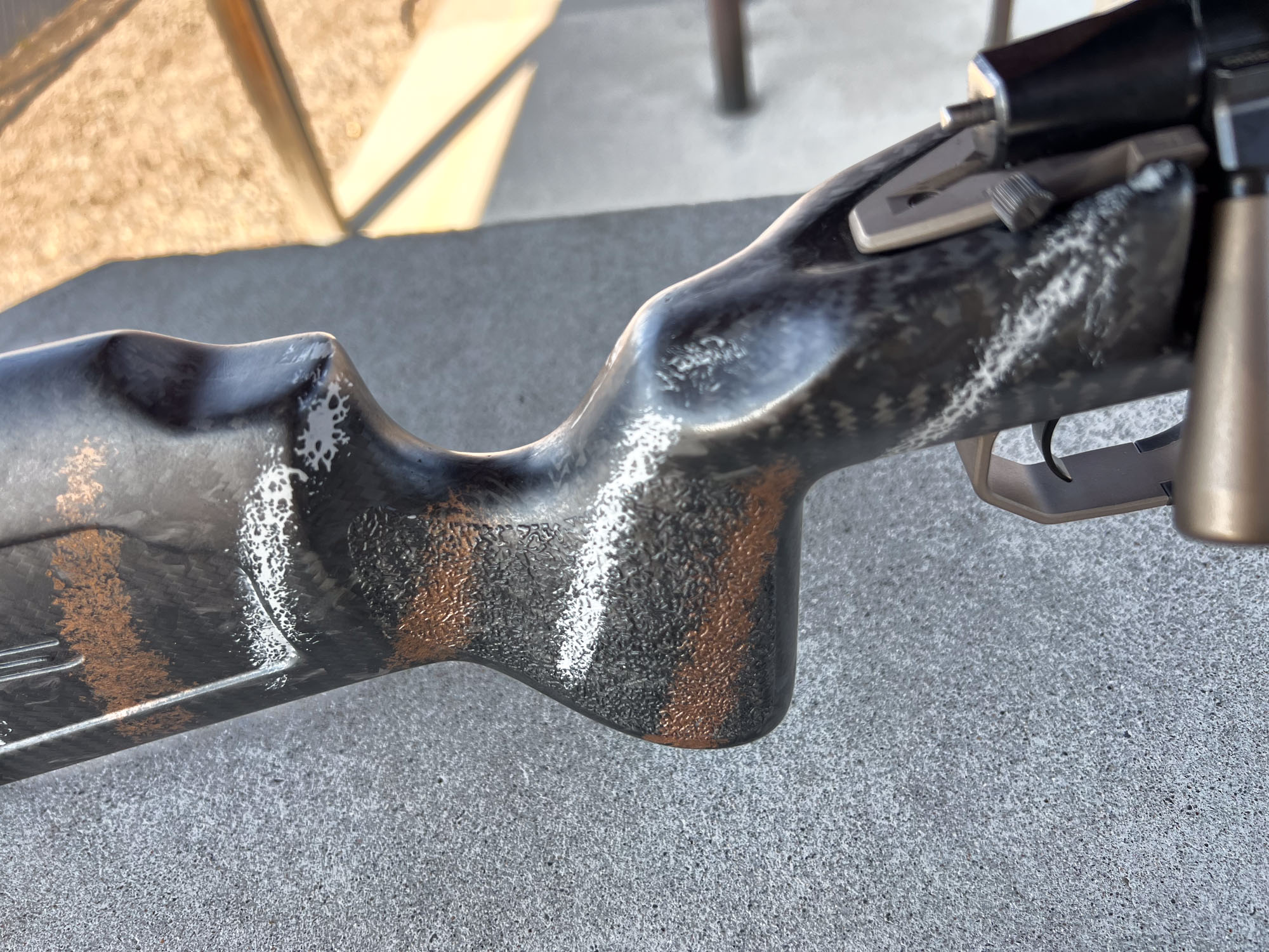 The grip of a custom Mack Brothers rifle.