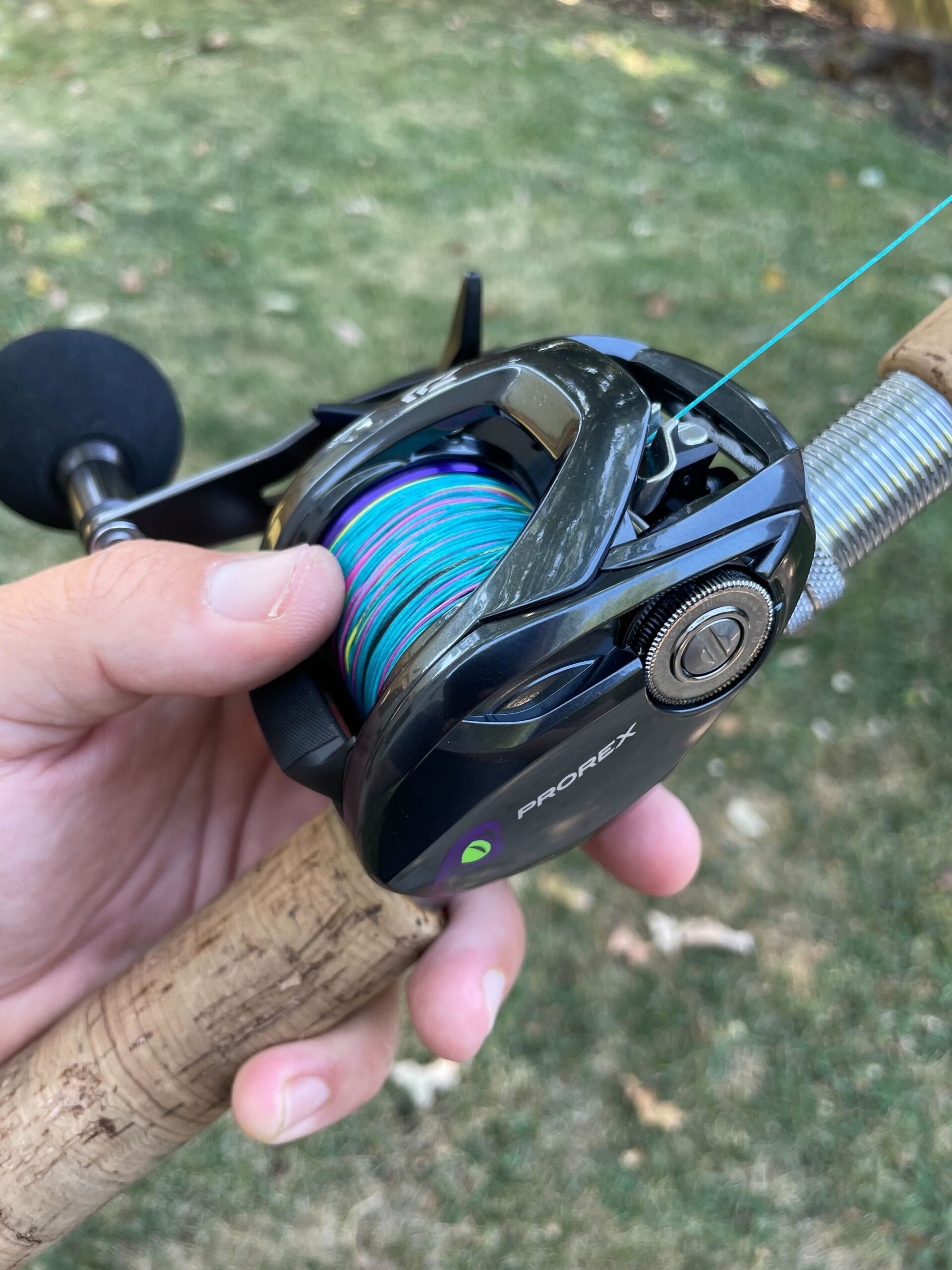 Tester holds rigged Daiwa Prorex TWS.