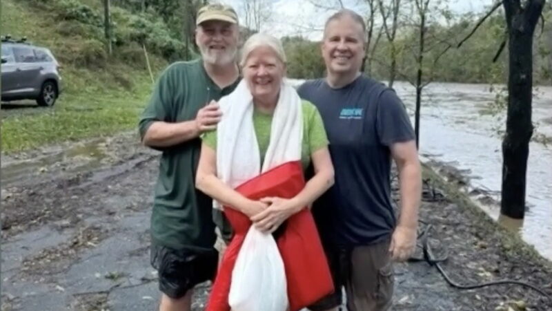 WATCH: Man Rescues Woman From Raging Floodwaters