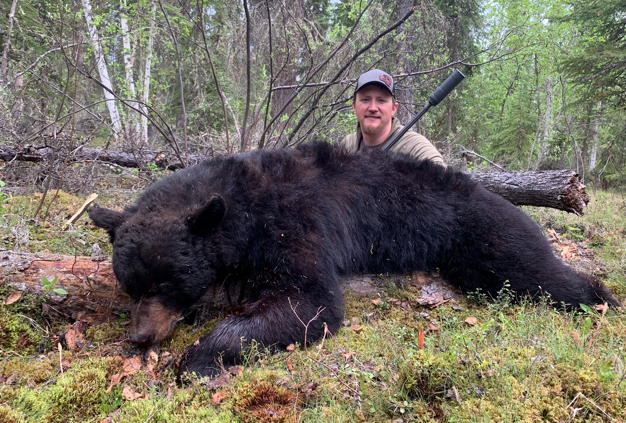 Freel with huge black bear 6.5 Creedmoor