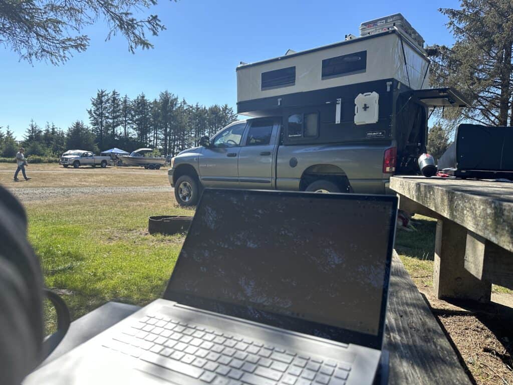 Four Wheel Campers Project M with laptop using RoamLink Connect (Image: @LiveWorkDream)