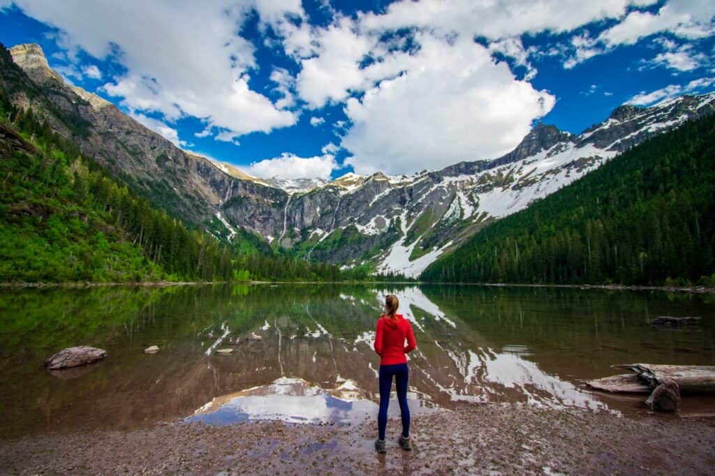 Woman admiring the beauty of nature, Glacier NP, United States