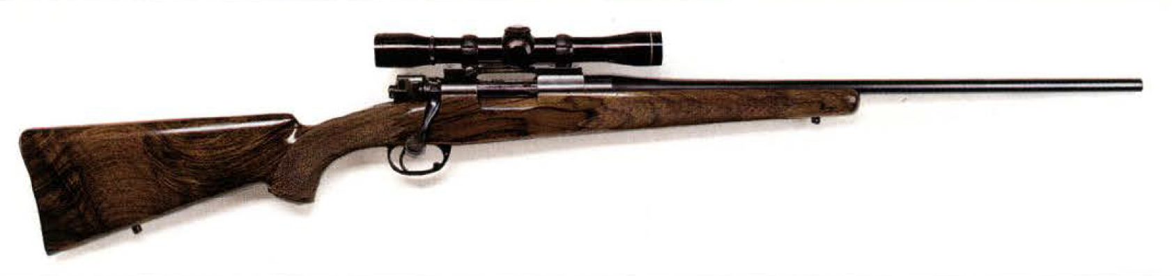 A wood stocked rifle made by Ron Lampert and Don Allen