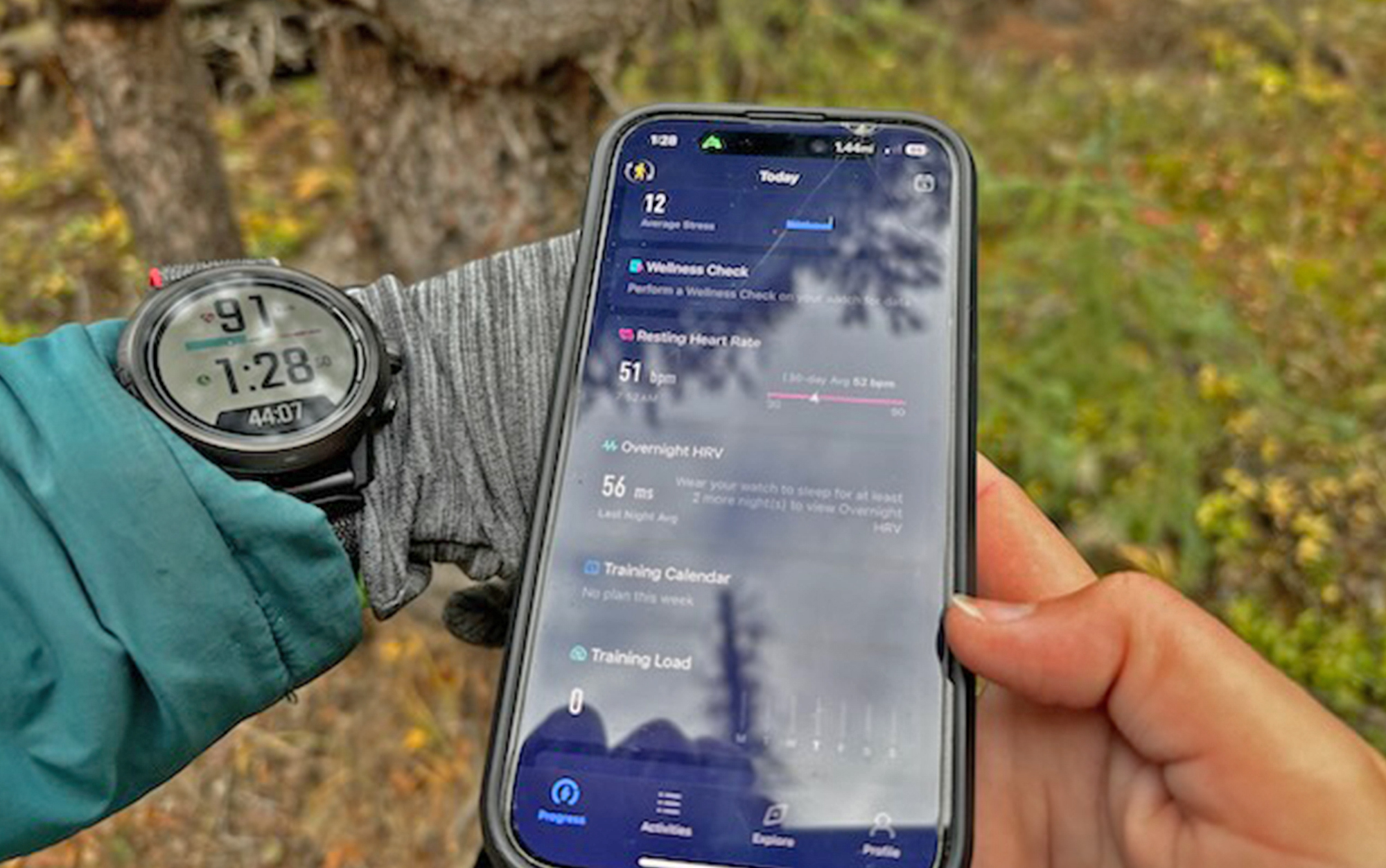 Hiker wears Corus hiking watch and uses corresponding app.