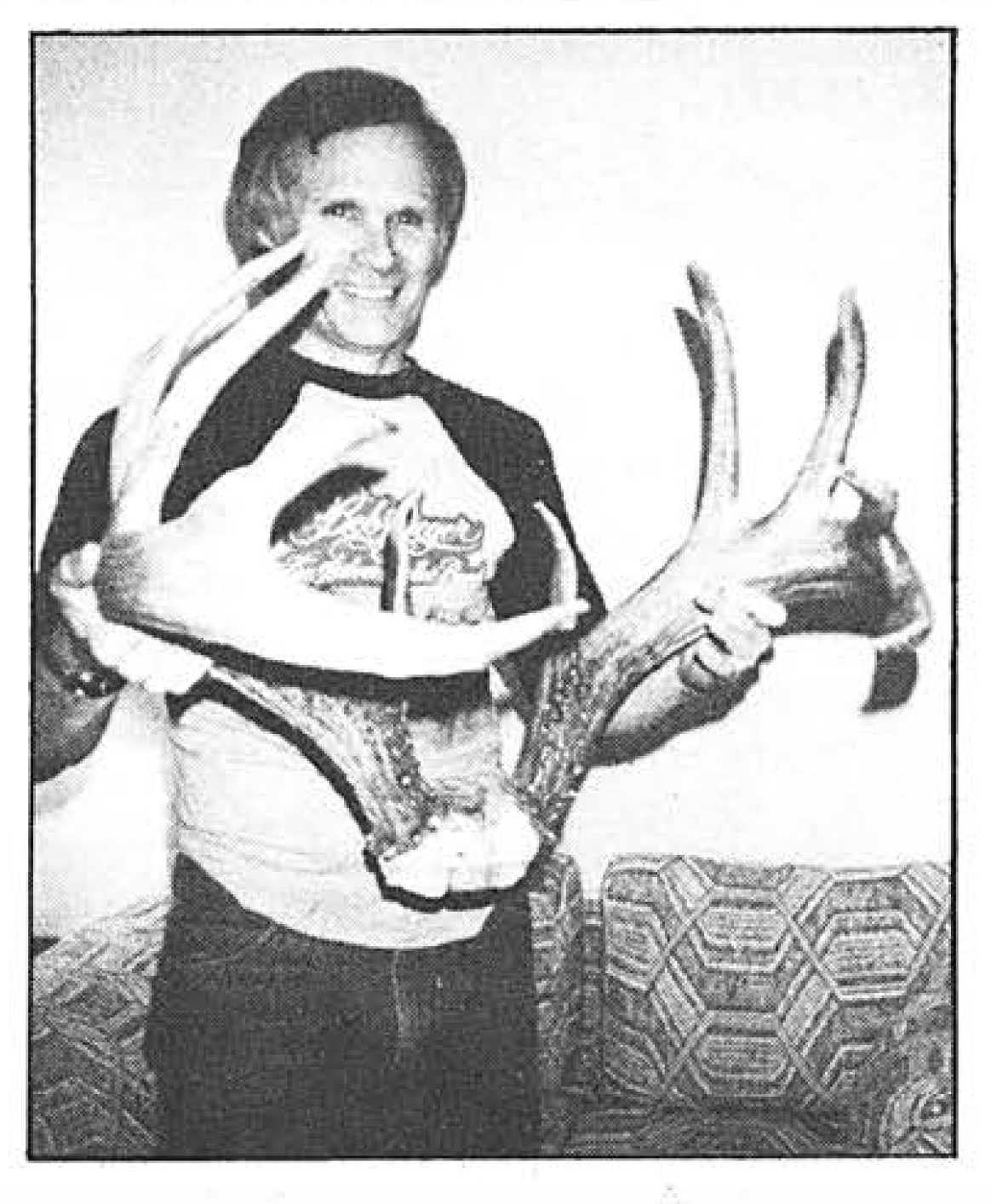 A man holding up a jordan buck