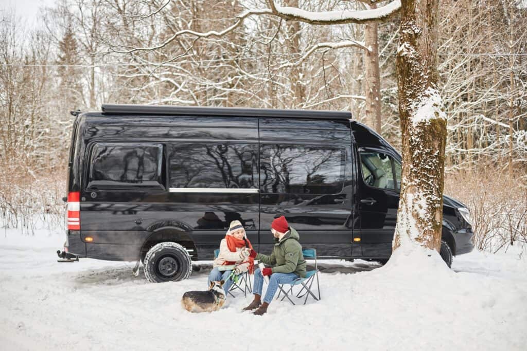 Couple winter Camping with RV snow tires