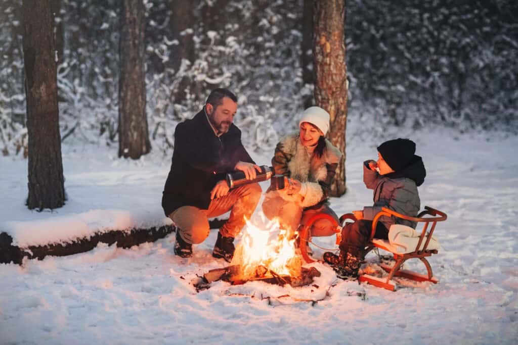 Family winter camping with RV camping accessories