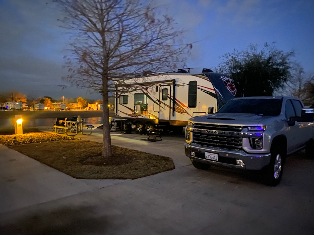 Truck and trailer in a campsite at Greenlake RV Resort.