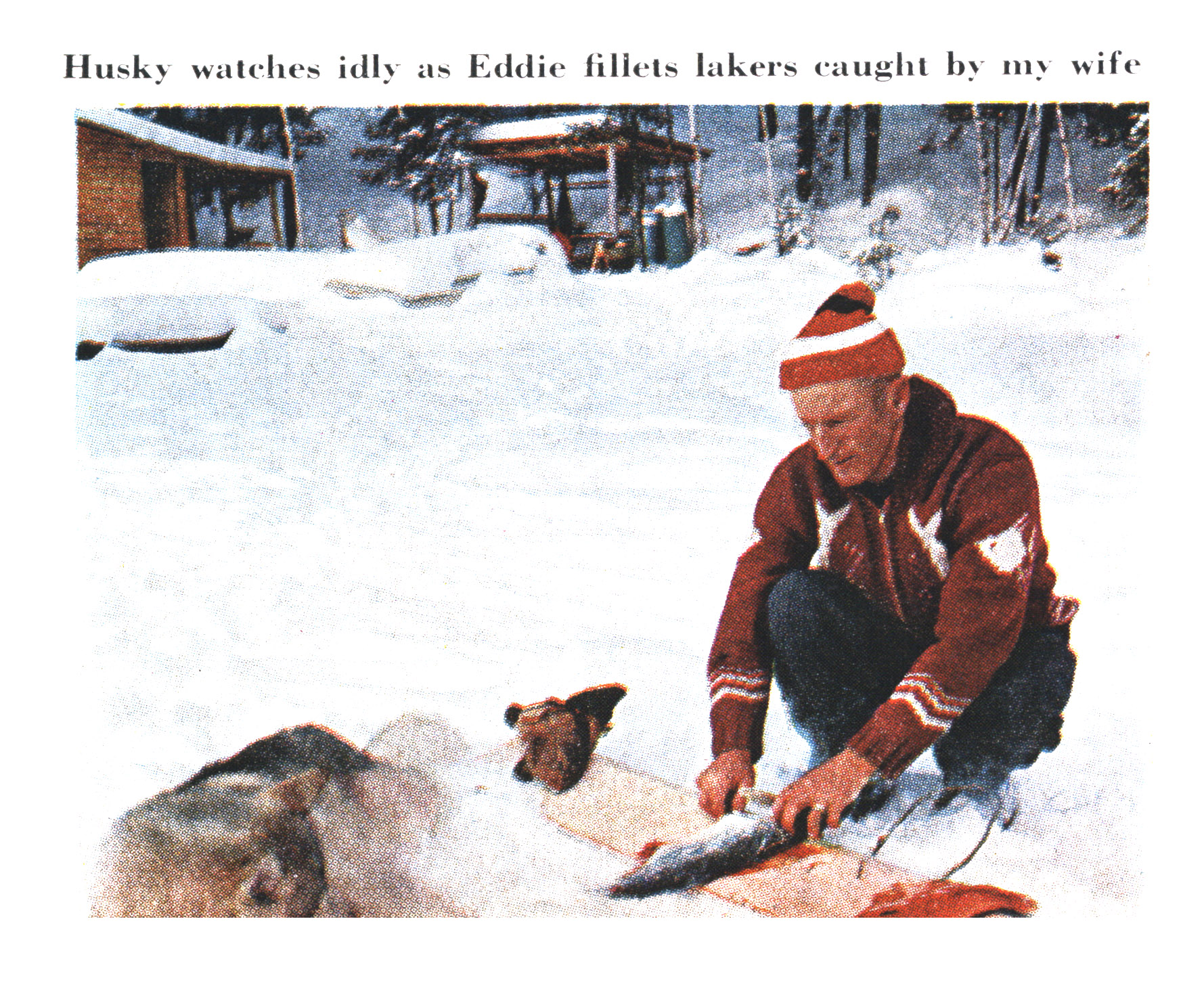 A vintage photo of a man in a red sweater and a red hat filleting a fish.