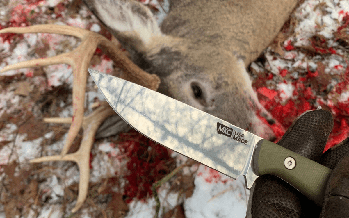 premium hunting knife with buck