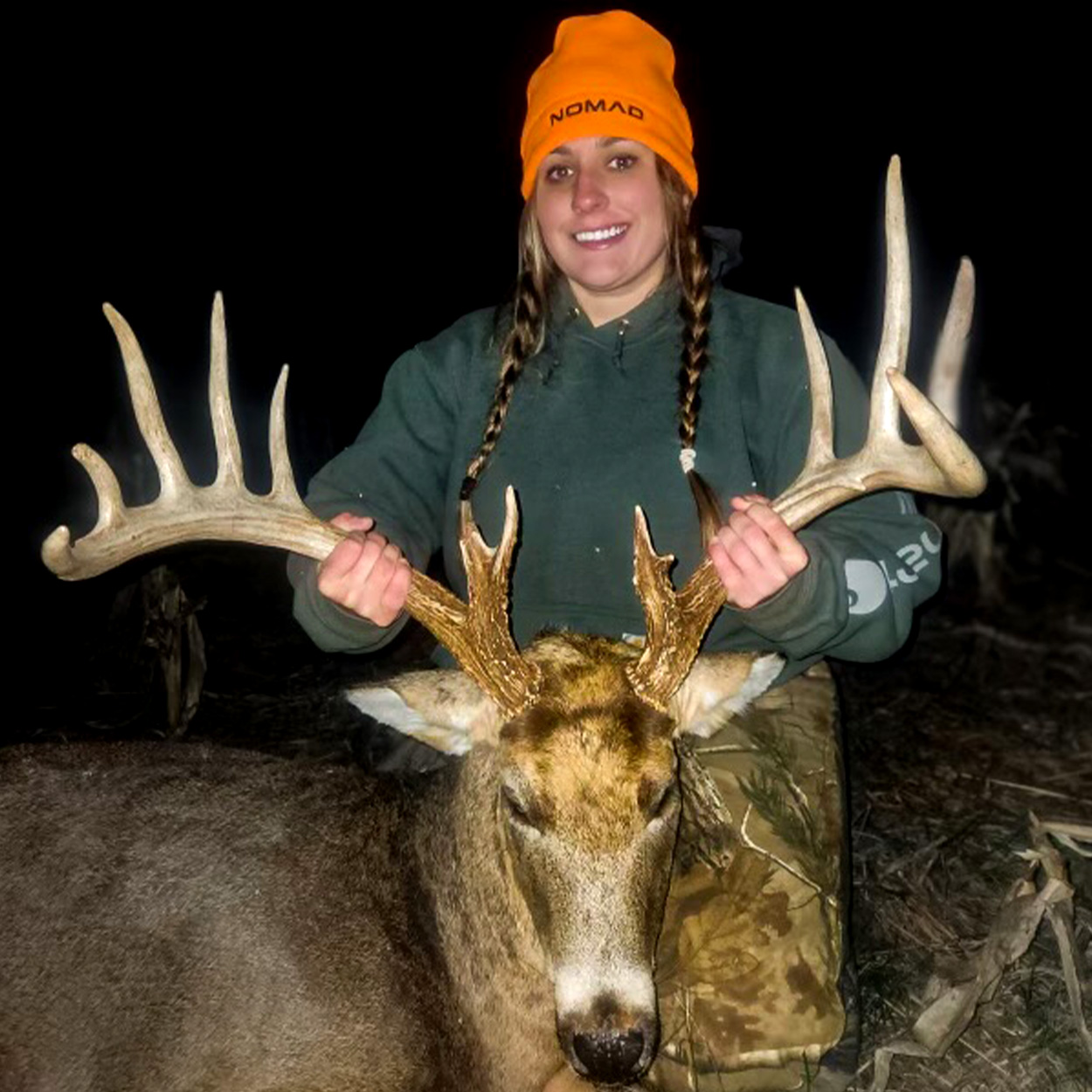 A Pennsylvania hunter with a giant, wide-racked whitetail buck.